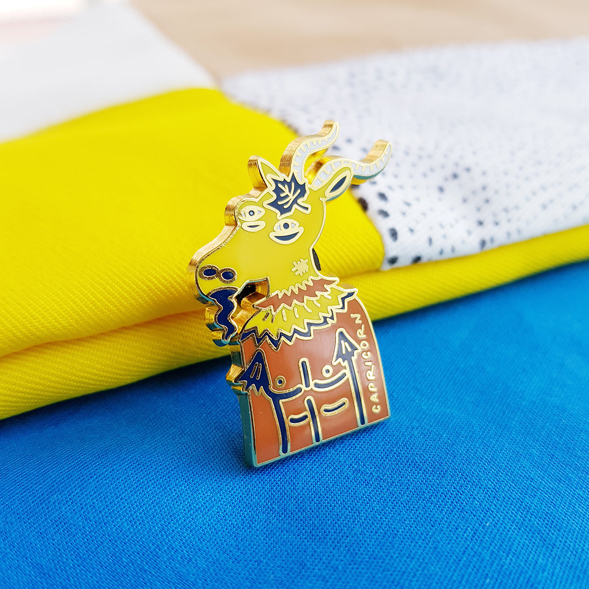 Capricorn zodiac enamel pin